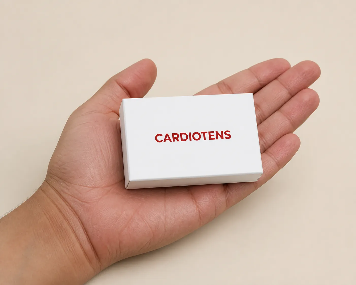 Cardiotens Plus High price — Verpackung in der Hand